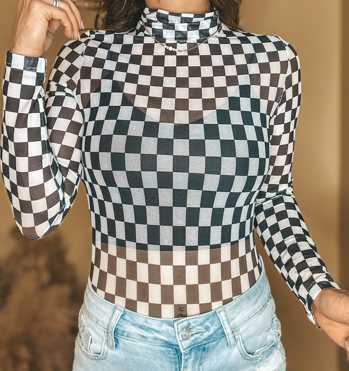 The Brittany Checkered Mesh Bodysuit in Black